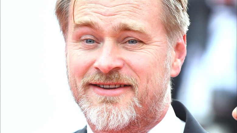 Christopher Nolan with beard and smiling