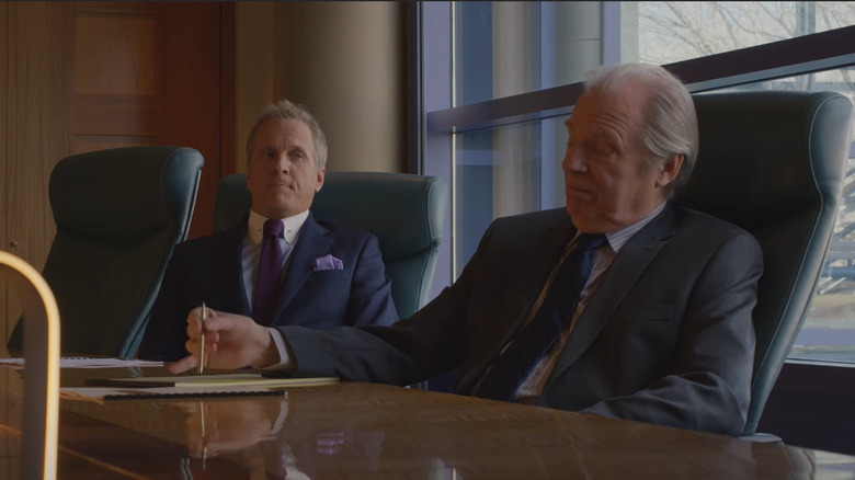 Chuck and Howard in a meeting