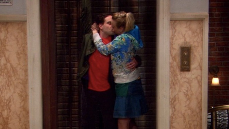 Leonard and Penny kissing in the elevator