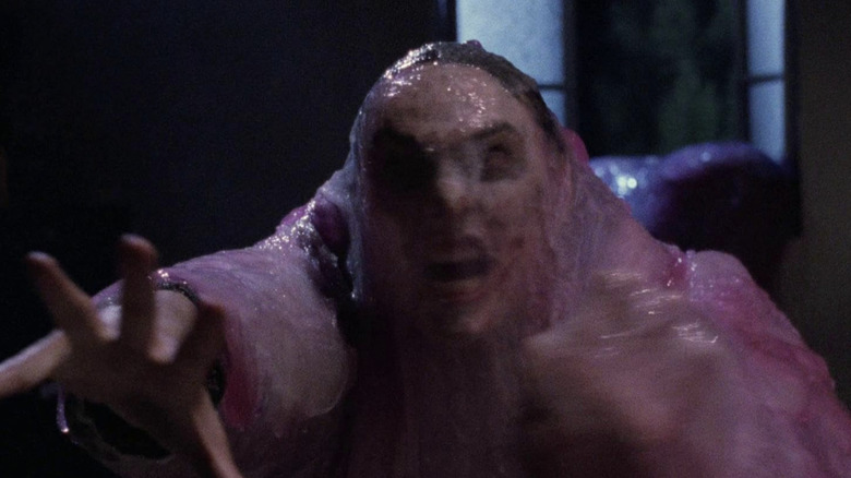 The Blob absorbing someone in "The Blob" (1988)
