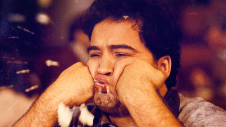 Bluto doing an impression of a zit in Animal House