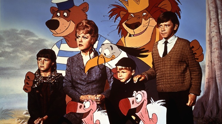 The human and animated animal characters of Bedknobs and Broomsticks watching a sporting event (1971)