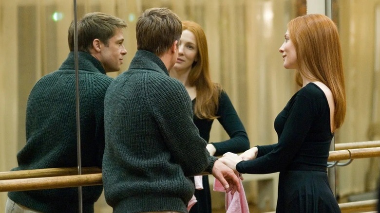 Benjamin Button and Daisy Fuller reuniting in a dance studio in The Curious Case of Benjamin Button (2008)