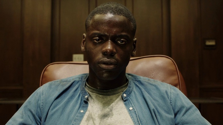 Chris Washington sitting in a chair in "Get Out"