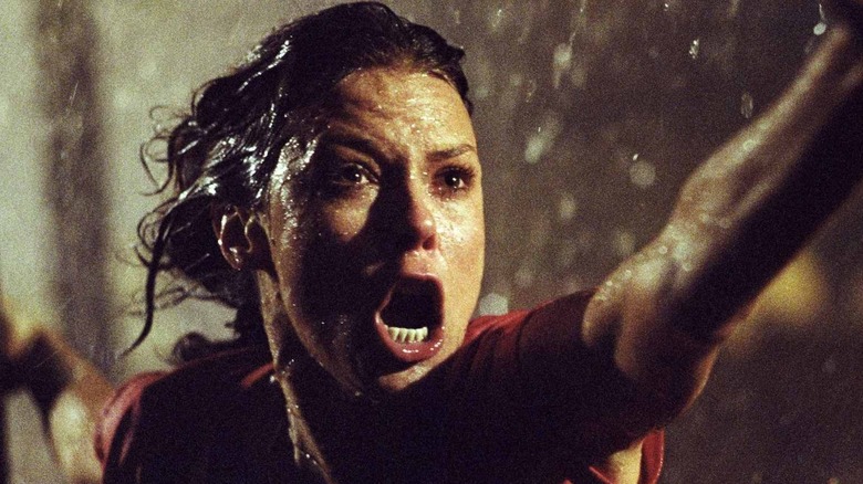 Diane Freeling screaming and reaching out in 