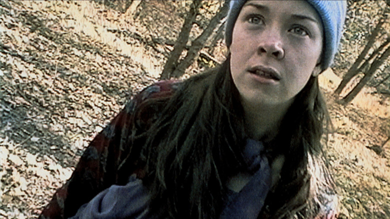Heather Donahue in the woods in "The Blair Witch Project"