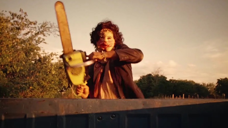 Leatherface chasing the truck  in "The Texas Chain Saw Massacre" (1974)