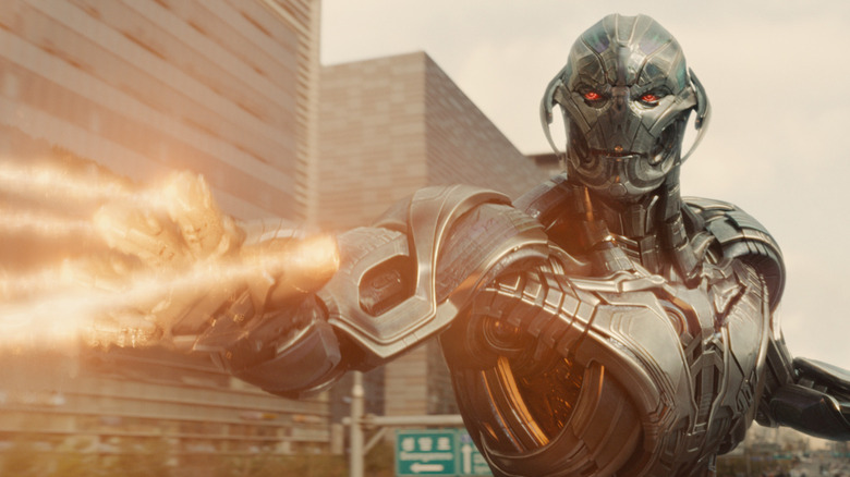 Ultron shooting lasers out of his hand in Avengers: Age of Ultron (2015)