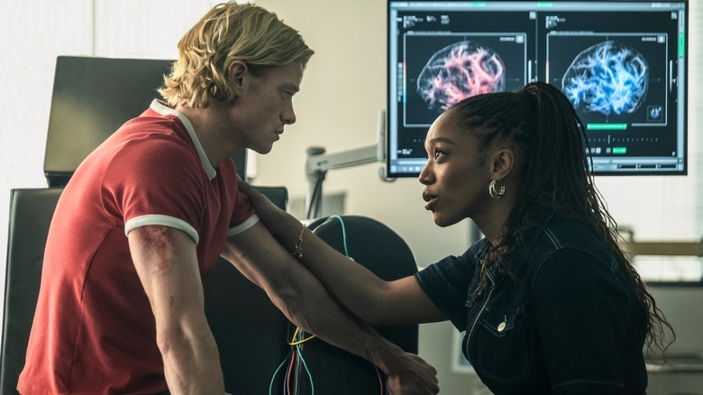 Dr. Caitlyn Corr placing her hand on Matt Hagen's arm