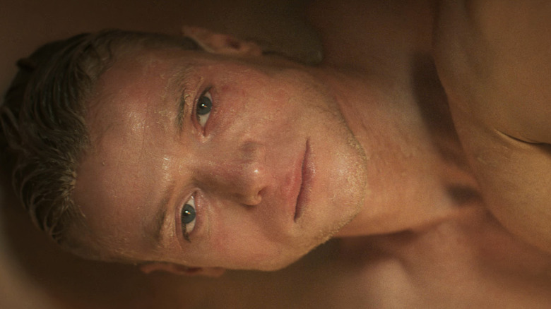 Matt Hagen laying down looking sad in "Clayface" (2026)