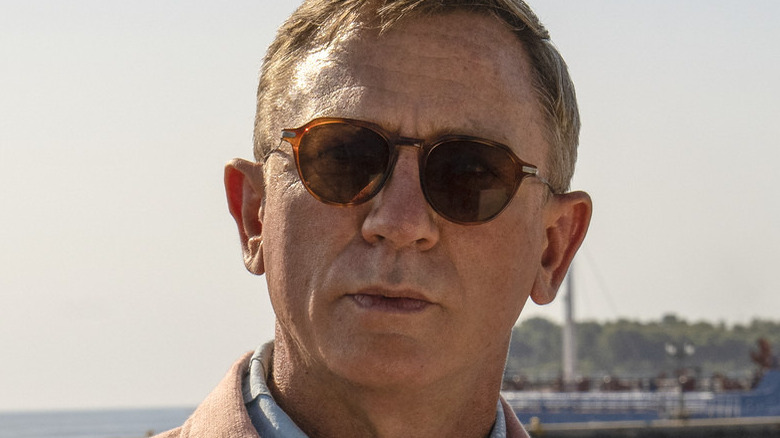 Benoit Blanc wearing sunglasses in close-up