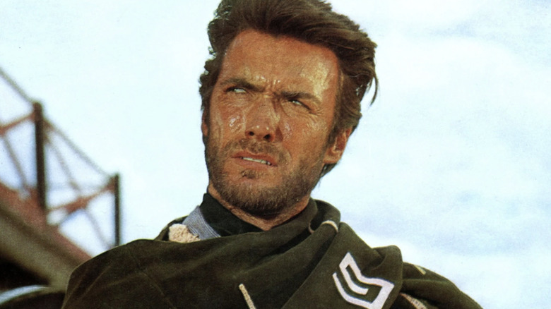 The Stranger sneers up at someone in "A Fistful of Dollars" (1964)
