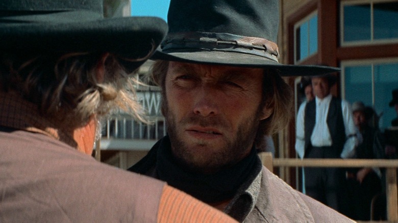 The Stranger talking to a local in High Plains Drifter