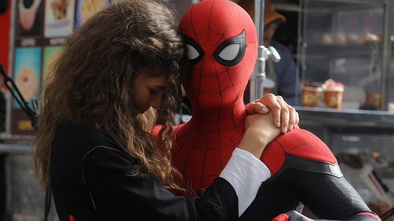 MJ holding on to Peter as Spider-Man in Spider-Man: Far From Home