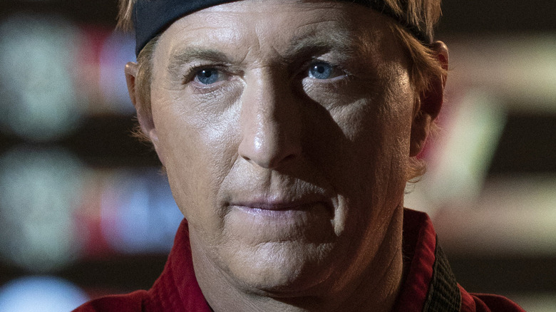 Johnny Lawrence with a headband