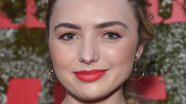 Peyton List smiling at a movie premier