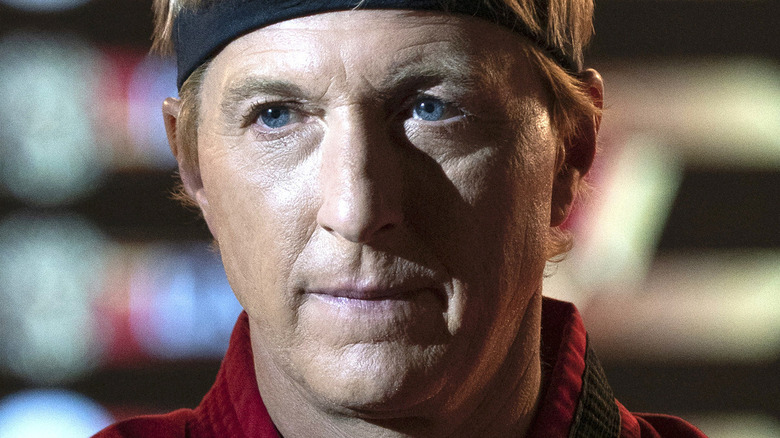 Johnny Lawrence with a headband