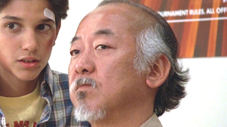 Mr. Miyagi and Daniel standing together