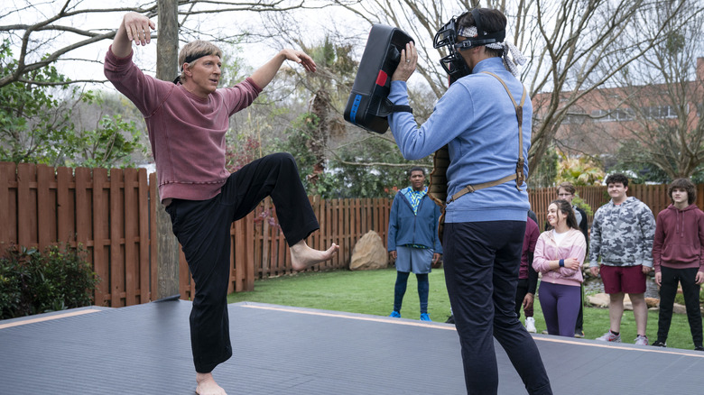 William Zabka in a crane stance