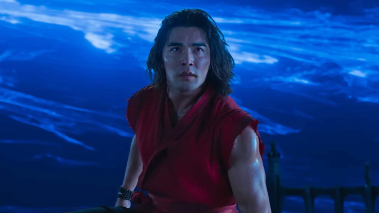 Liu Kang in front of a blue portal in "Mortal Kombat 2" (2026)