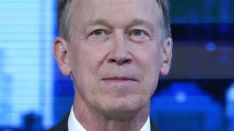 John Hickenlooper staring ahead