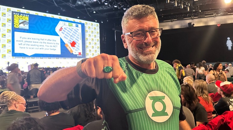 Lanterns fan showing off custom ring at SDCC 2026