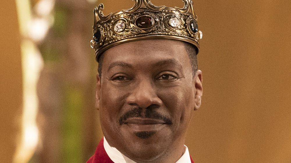 Prince Akeem wears a crown