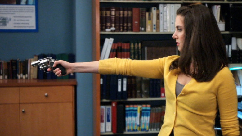 Annie pointing a gun in "Community"