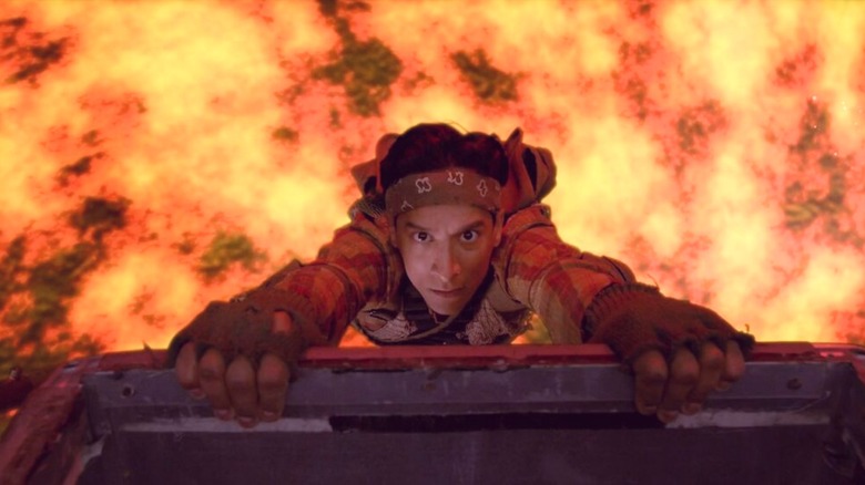 Abed clinging onto a ledge over lava in "Community"
