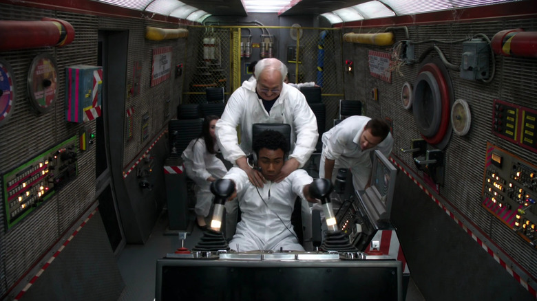 Pierce strangles Troy in the Winnebago in "Basic Rocket Science" (2010)