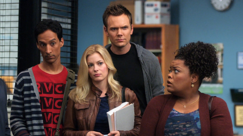Abed, Britta, Jeff, and Shirley confused