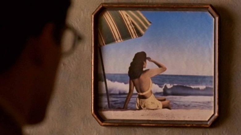 Barton Fink looks at picture