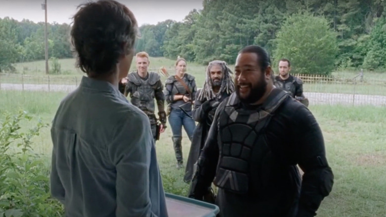 Jerry greeting Carol at her cabin outside of the Kingdom