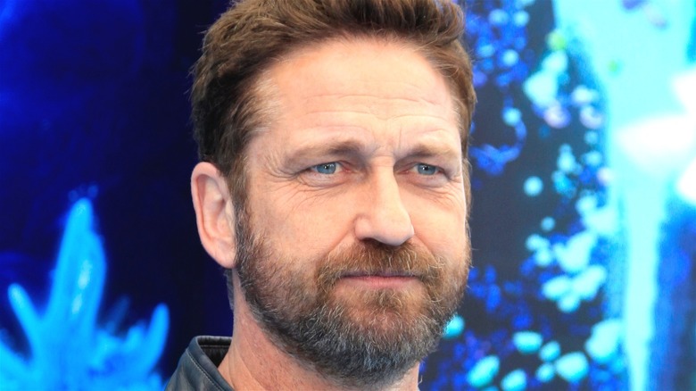 Gerard Butler sort of smiling