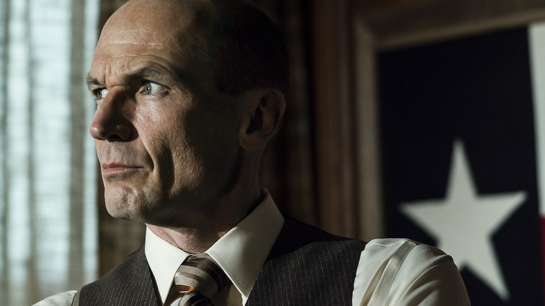 Toby Huss staring intently