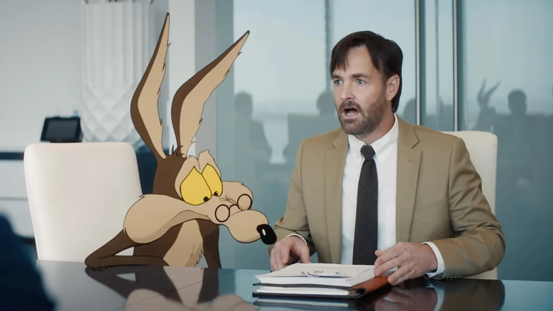 Wile E. Coyote looking at documents Kevin's holding in Coyote vs. Acme