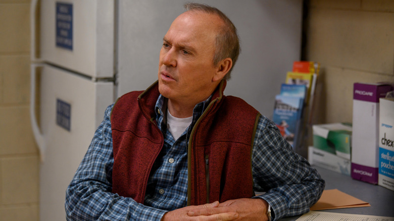 Dr. Samuel Finnix leaning against a counter in "Dopesick" (2021)