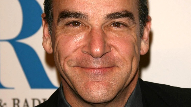 Mandy Patinkin smiling at event