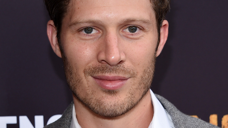 Zach Gilford poses