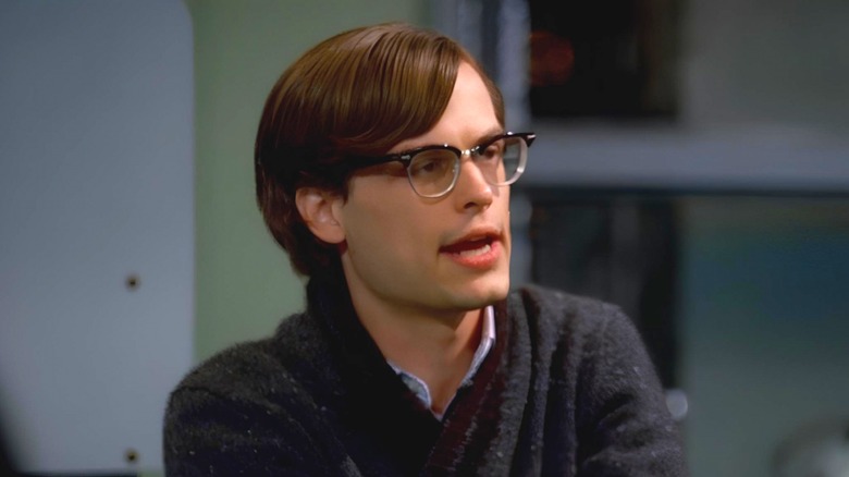 Dr. Spencer Reid wearing glasses