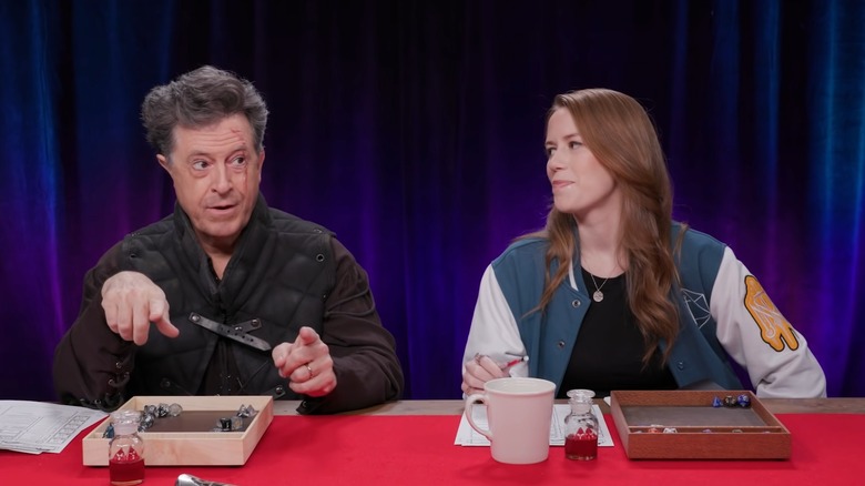 Marisha Ray and Stephen Colbert smiling