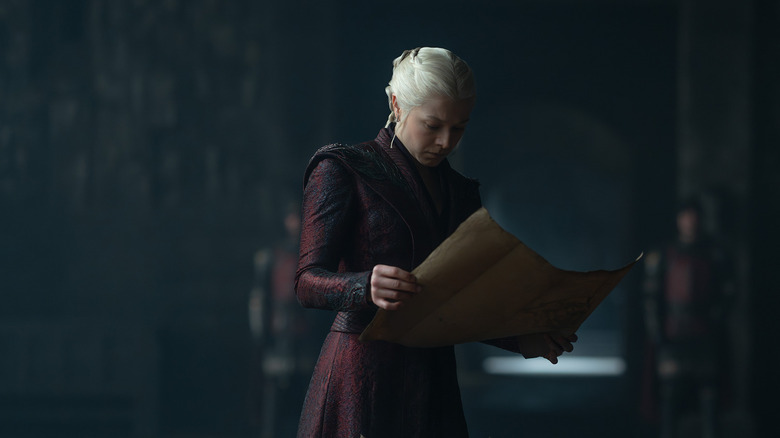 Rhaenyra reading a scroll on House of the Dragon