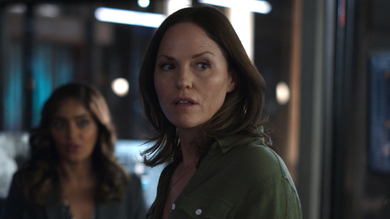 Jorja Fox as Sara looking surprised