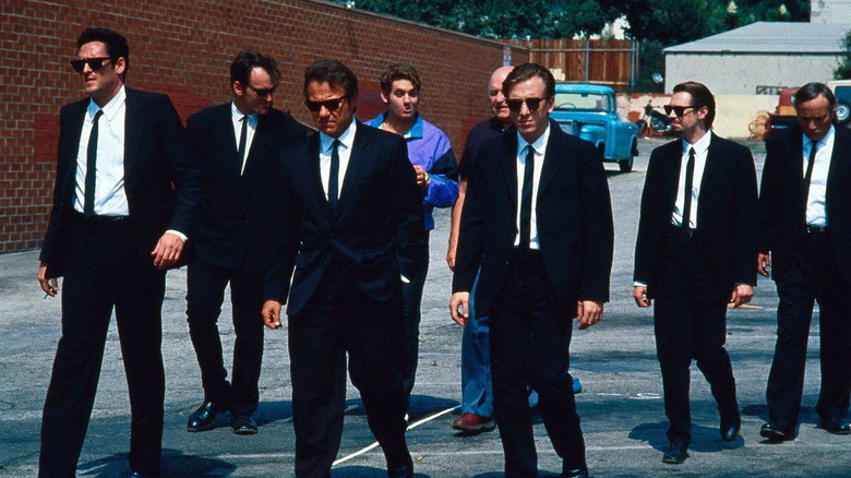 Criminals walking together in suits in Reservoir Dogs