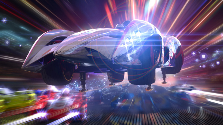 The Mach 5 leaping over other cars on the race track in Speed Racer