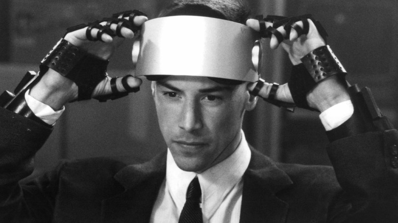 Johnny putting on digital interface gear in Johnny Mnemonic (1995)