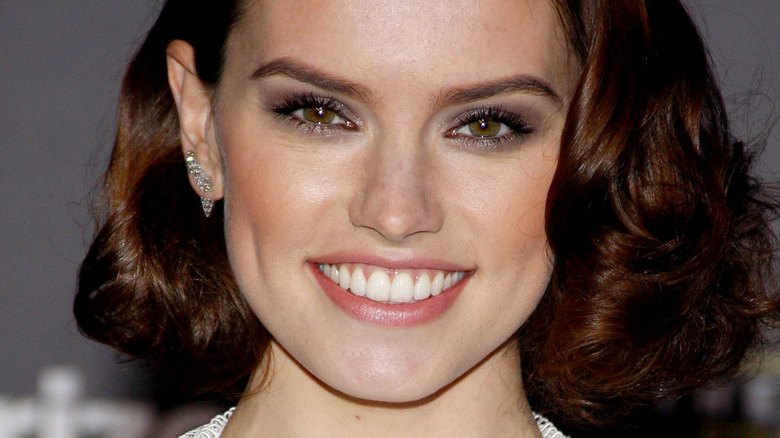 Daisy Ridley smiles