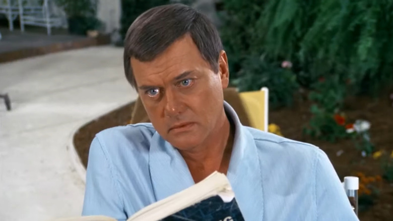 JR Ewing looking stunned