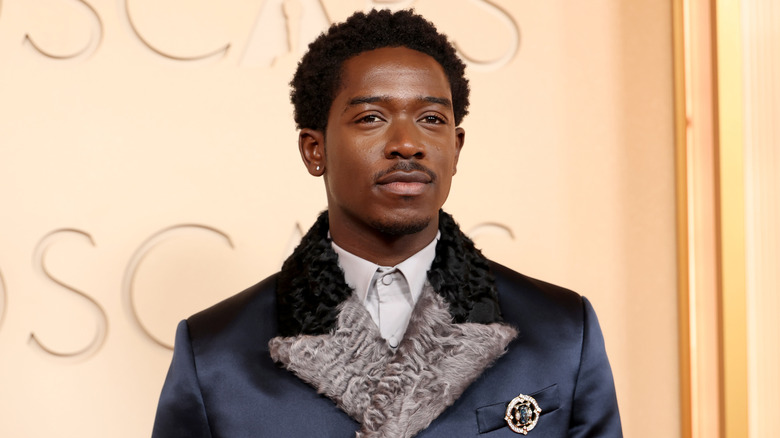 Damson Idris posing for a photo at the 2026 Academy Awards