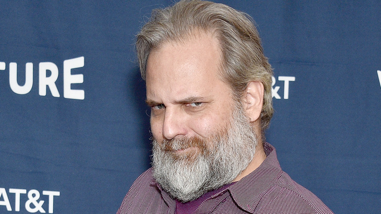 Dan Harmon posing devilish